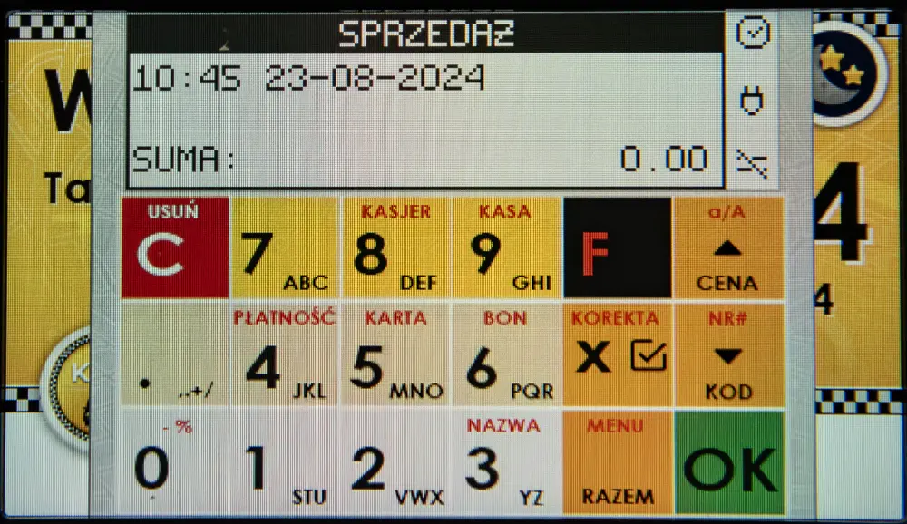 Kolorowy ekran taksometru z widokiem menu kasy fiskalnej.