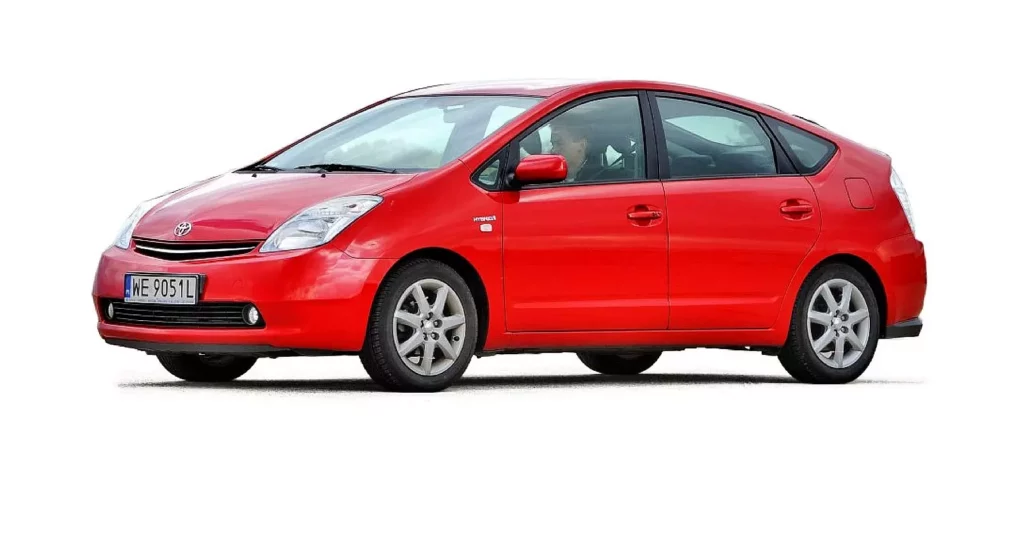 Zdjęcie ilustruje pytanie: jaki samochód na taksówkę i przedstawia Toyota Prius